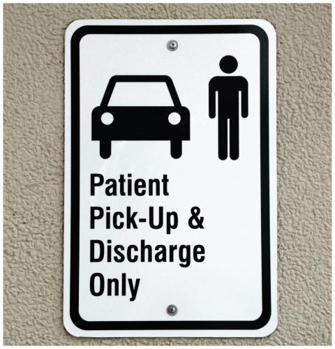 Sign indicating patient pick-up and discharge area